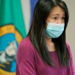 Noriko Nasu, a high school teacher who was attacked earlier in the year while walking through Seattles Chinatown-International District, speaks about the possible hate crime at a news conference at Renton City Hall. Nasu joined Washington Gov. Jay Inslee and other leaders Monday to denounce recent acts of violence and harassment targeting Asians and Asian communities. (AP Photo/Ted S. Warren)