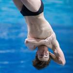 Benson Boone, then a Monroe High School student, twists during 1-meter diving competition at the Washington 4A swimming championships in Federal Way on Feb. 22, 2020. (Andy Bronson / The Herald)