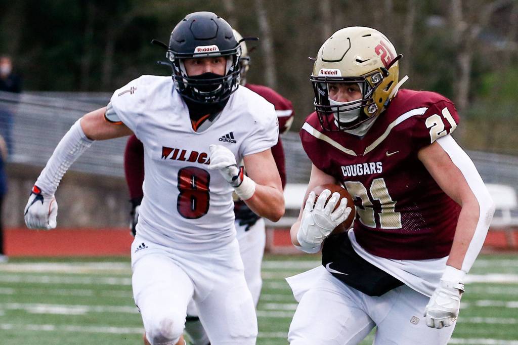 The Lakewood Cougars defeated the visiting Archbishop Murphy Wildcats 32-21 at Lakewood High Friday night in Arlington on March 26, 2021. (Kevin Clark / The Herald)
