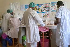 Medical workers prepare medicine at the Matanda Hospital in Butembo, where the first case of Ebola died, in the North Kivu province of Congo Thursday, Feb. 11, 2021. A second case and death of Ebola has been recorded in Congo's North Kivu province after a 60-year-old woman died Wednesday, according to officials. (AP Photo/Al-hadji Kudra Maliro)