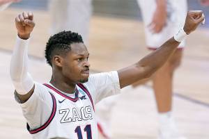 Gonzaga guard Joel Ayayi (11) reacts to a play against Creighton in the first half of a Sweet 16 game in the NCAA men's college basketball tournament at Hinkle Fieldhouse in Indianapolis, Sunday, March 28, 2021. (AP Photo/Michael Conroy)