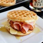 A drizzle of real maple syrup gives a ham and cheese waffle sandwich a sweet finish.(Gretchen McKay / Pittsburgh Post-Gazette)