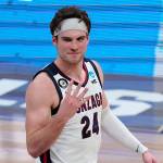 Gonzaga forward Corey Kispert (24) reacts after an Elite 8 game against Southern California in the NCAA men's college basketball tournament at Lucas Oil Stadium, Tuesday, March 30, 2021, in Indianapolis. Gonzaga won 85-66. (AP Photo/Michael Conroy)