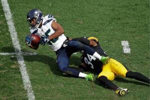 Seattle Seahawks wide receiver Tyler Lockett (16) is tackled by Pittsburgh Steelers strong safety Terrell Edmunds (34) during an NFL football game, Sunday, Sept. 15, 2019, in Pittsburgh. (AP Photo/Gene J. Puskar)