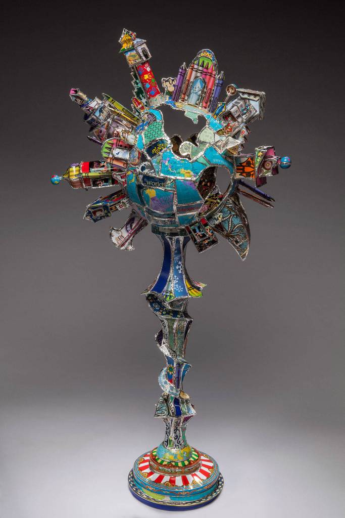 Tin Town Globe by Kathy Ross is on display at the Schack.