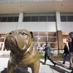 Fans pass a bulldog statue, the teams mascot, on their way to the entrance at the McCarthey Athletic Center on the Gonzaga University campus in 2014. (AP Photo/Young Kwak, file)