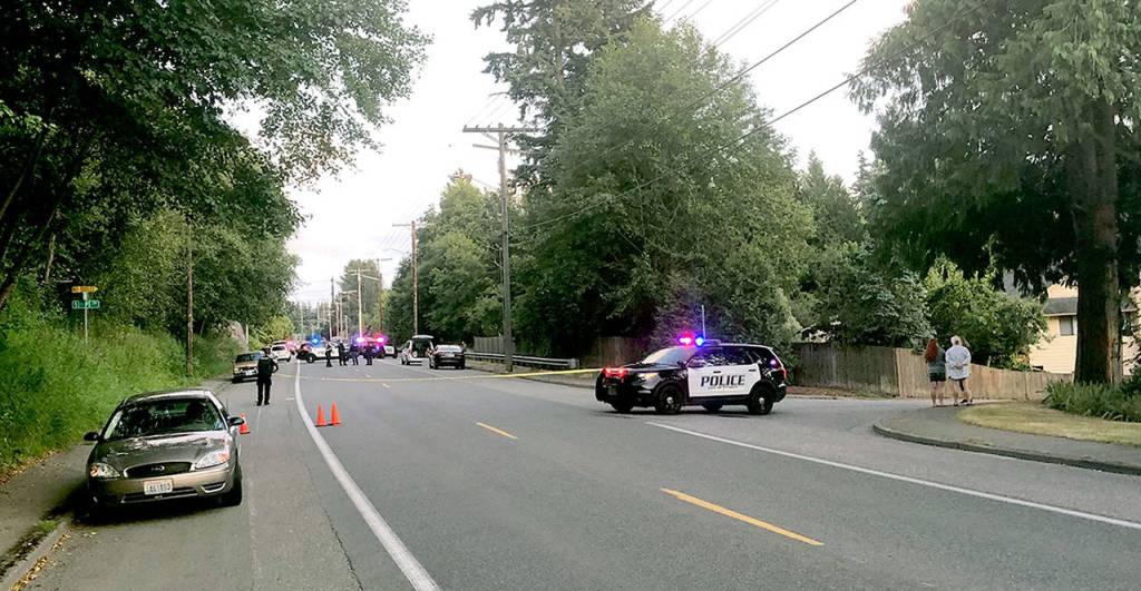 Police tape off the scene of the shooting on Glenwood Avenue near 51st Place SW in Everett on July 6, 2019. (Janice Podsada / The Herald)