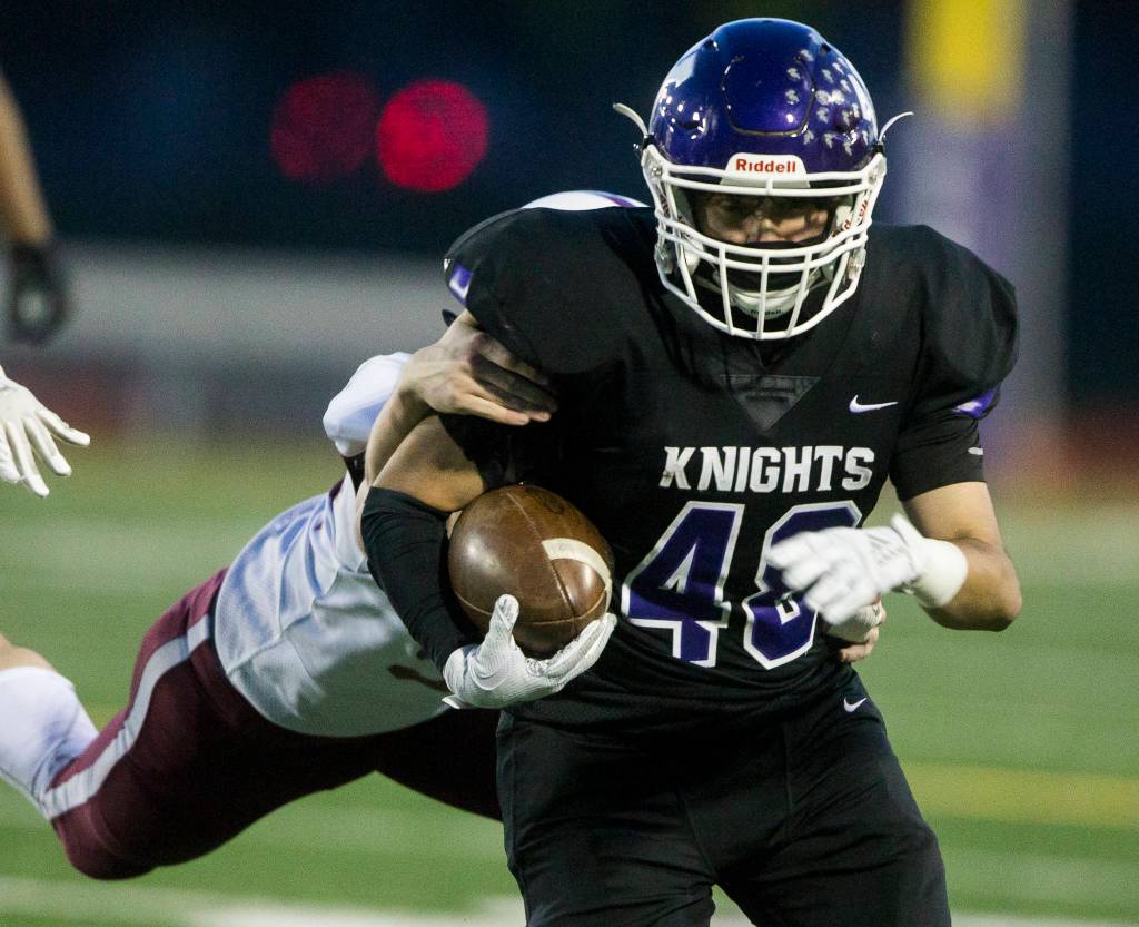 Kamiaks Gabriel Dominguez is tackled during a game against Cascade on April 1, 2021, in Everett. (Olivia Vanni / The Herald)