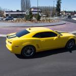 Drivers go around a roundabout at 204th Street NE and 77th Avenue NE on Monday, April 12, 2021 in Arlington, Washington.  (Andy Bronson / The Herald)