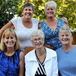 Jeanne Metzger (center, bottom row) on her 85th birthday with daughters Maddy Metzger-Utt (top left), Jo Metzger-Levin (top right), Meg Metzger (bottom left) and Jan Brossman (bottom right). A longtime Herald editor, Jeanne Metzger died Wednesday at age 89. (Contributed photo)