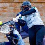 Jackson's Amanda Wingert connects with a pitch during a game against Everett on Thursday afternoon at Henry M. Jackson High School in Mill Creek on April 8, 2021. The Timberwolves won 14-0. (Kevin Clark / The Herald)