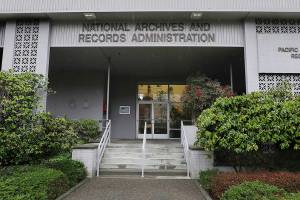 FILE - This Jan. 23, 2020, file photo shows the National Archives in the Sand Point neighborhood of Seattle that has about a million boxes of generally unique, original source documents and public records. In an announcement made Thursday, April 8, 2021, the Biden administration has halted the sale of the federal archives building in Seattle, following months of opposition from people across the Pacific Northwest and a lawsuit by the Washington Attorney General's Office. Among the records at the center are tribal, military, land, court, tax and census documents. (Alan Berner/The Seattle Times via AP, File)