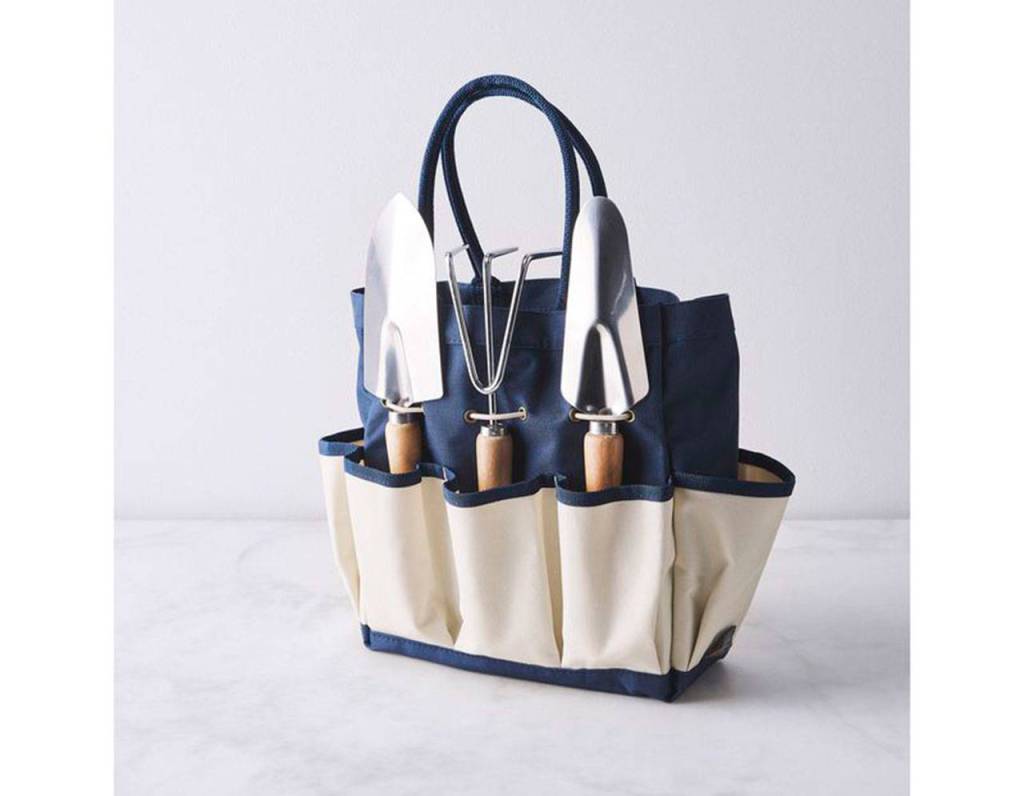 Picnic Times Essential Garden Tote has nooks aplenty for all your essentials (gloves, pruning shears, potting soil, you name it). (food52.com)