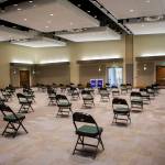 A large waiting area for people after receiving their vaccinations at Angel of the Winds Arena on April 6 in Everett. (Olivia Vanni / Herald file)