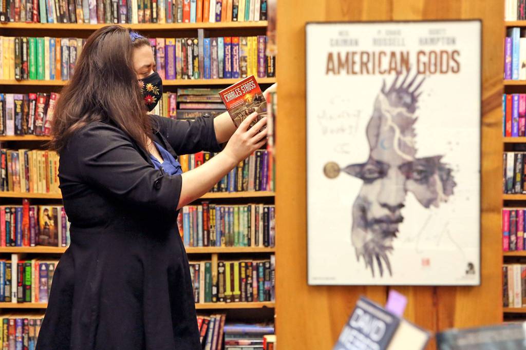 Emily Newman bought Main Street Books in Monroe in 2012. (Kevin Clark / The Herald)