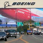 FILE - In this Oct. 1, 2020 file photo, traffic passes the Boeing airplane production plant, in Everett, Wash.  U.S. manufacturers expanded in March 2021 at the fastest pace in 37 years, a sign of strengthening demand as the pandemic wanes and government emergency aid flows through the economy.  (AP Photo/Elaine Thompson, file)