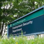 FILE - In this May 26, 2020, file photo, a sign at the headquarters for the Washington state Employment Security Department is shown at the Capitol in Olympia, Wash. Washington state's rush to get unemployment benefits to residents who lost jobs due to the coronavirus outbreak left it vulnerable to criminals who made off with hundreds of millions of dollars in fraudulent claims. (AP Photo/Ted S. Warren, File)