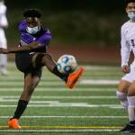 Kamiaks Glenn Wabaluku takes a shot on goal during a game against Meadowdale on April 16, 2021, in Mukilteo. (Olivia Vanni / The Herald)