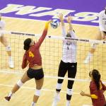 Washingtons Lauren Sanders, a Glacier Peak alum, blocks a spike attempt during a match against USC on March 14, 2021, in Seattle. (Scott Eklund/Red Box Pictures)