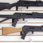 Semi-automatic rifles are displayed on a wall at a gun shop in Lynnwood. Lawmakers in Oregon are considering a proposed gun storage law that would be among the strongest in America (Associated Press file)