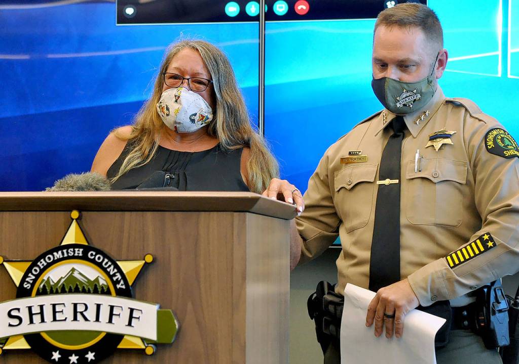 Sharon Lee (left), mother of Melissa Lee, speaks to media July 29, 2020, with Sheriff Adam Fortney. (Sue Misao / Herald file)
