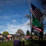 A Black Lives Matter flag blows in the wind outside of the Marysville School District Service Center on Wednesday. (Olivia Vanni / The Herald)