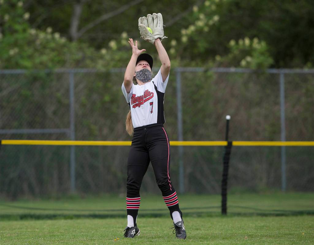 Marysville Pilchucks Morgan Crawford hauls in a catch in the outfield during a game against Jackson on April 28, 2021, in Mill Creek. Jackson beat Marysville Pilchuck 6-0. (Andy Bronson / The Herald)