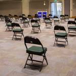 A large waiting area for people after receiving their vaccinations at Angel of the Winds Arena on Tuesday, April 6, 2021 in Everett, Wa. (Olivia Vanni / The Herald)