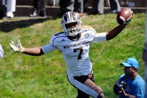 Western Michigan wide receiver D'Wayne Eskridge (7) reacts after scoring a touchdown during the second half of an NCAA college football game against Northwestern in Evanston, Ill., Saturday, Sept. 3, 2016. (AP Photo/Matt Marton)