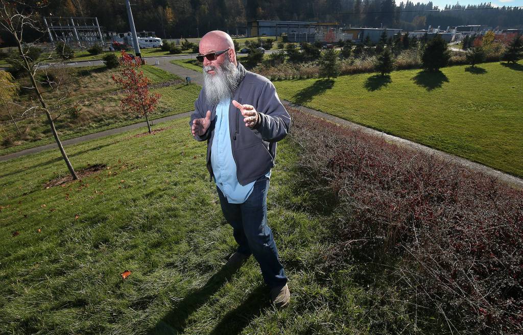 Geoscientist Brian Sherrod stands near the submerged southern Whidbey Island fault line at the Brightwater Treatment Plant in Woodinville. (Andy Bronson / The Herald)