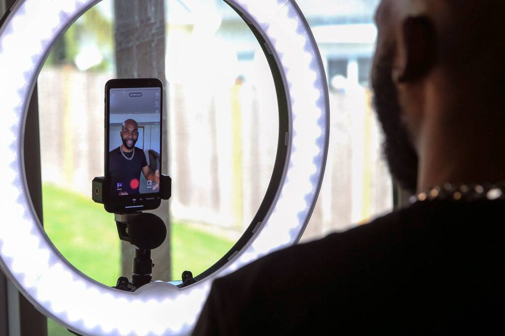 Josh Otusanya, 27, former Lake Stevens High soccer player turned New York City comedian, has 5.4 million followers on TikTok for the inspirational videos that he makes from his familys home. (Kevin Clark / The Herald)