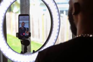 Josh Otusanya, 27, former Lake Stevens high soccer star turned comedian, has 4.6 million followers on TikTok for his inspirational videos from his family's home. (Kevin Clark / The Herald)