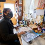 Cathy Tanasse works on a portrait for the Memory Project at her home March 19 in Snohomish. (Olivia Vanni / The Herald)