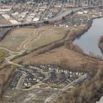 Construction of mixed-use buildings at the Riverfront redevelopment, seen here Jan. 15, 2019, could begin this summer. But a central movie theater on the 70-acre parcel wont be part of it any time soon. (Andy Bronson / Herald file)