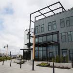 The Waterfront Place Apartments north building at the Port of Everetts Waterfront Place cold see residents moving in by May 15. on Thursday, April 22, 2021 in Everett, Washington. (Andy Bronson / The Herald)