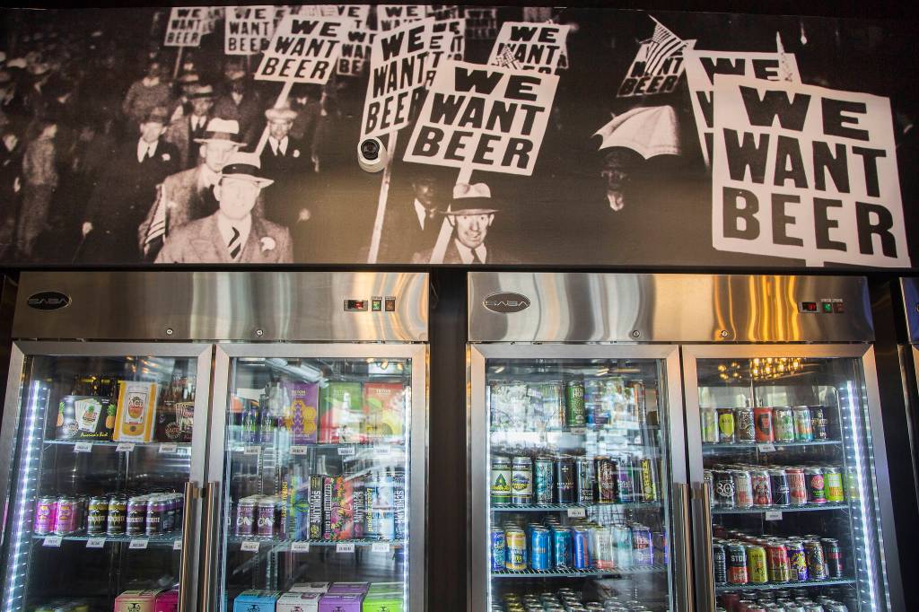 The Grape & Grain sports Prohibition-era black and white photos of bootleggers and speakeasies. (Andy Bronson / The Herald)