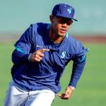 Prized outfielder Julio Rodriguez, one of the top prospects in baseball, runs the bases during Saturday afternoons practice. (Kevin Clark / The Herald)