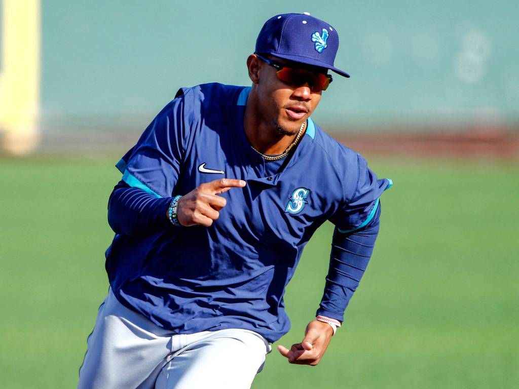 Prized outfielder Julio Rodriguez, one of the top prospects in baseball, runs the bases during Saturday afternoons practice. (Kevin Clark / The Herald)