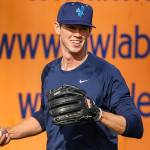 Emerson Hancock warms up Saturday afternoon during practice at Funko Field in Everett on May 1, 2021. (Kevin Clark / The Herald)