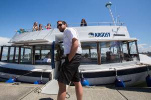 One of the Jetty Island ferry captains waits for boarders as the ferry begins operations for the summer on Wednesday, Jul. 6, 2016 in Everett, Wa. (Andy Bronson / The Herald)