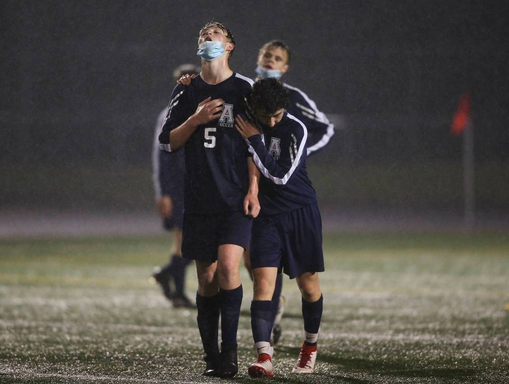 Arlingtons Aidan Raney (5) reacts after the final whistle is blown as Arlington beat Lakes Stevens 2-1 in a boys soccer match on Monday, May 3, 2021 in Arlington, Washington. (Andy Bronson / The Herald)