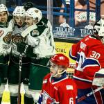 The Silvertips Cole Fonstad (left-right), Jackson Berezowski and Ethan Regnier celebrate Berezowskis goal in the second period as the Chiefs Mac Gross (6) and Mason Beaupit (30) look on during a game on May 7, 2021, at Angel of the Winds Arena in Everett. (Kevin Clark / The Herald)