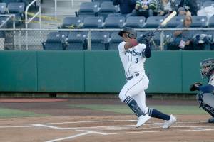 AquaSox outfielder Julio Rodriguez hits a double during the first inning of a game against the Dust Devils on May 11, 2021, at Funko Field in Everett. (Andy Bronson / The Herald)