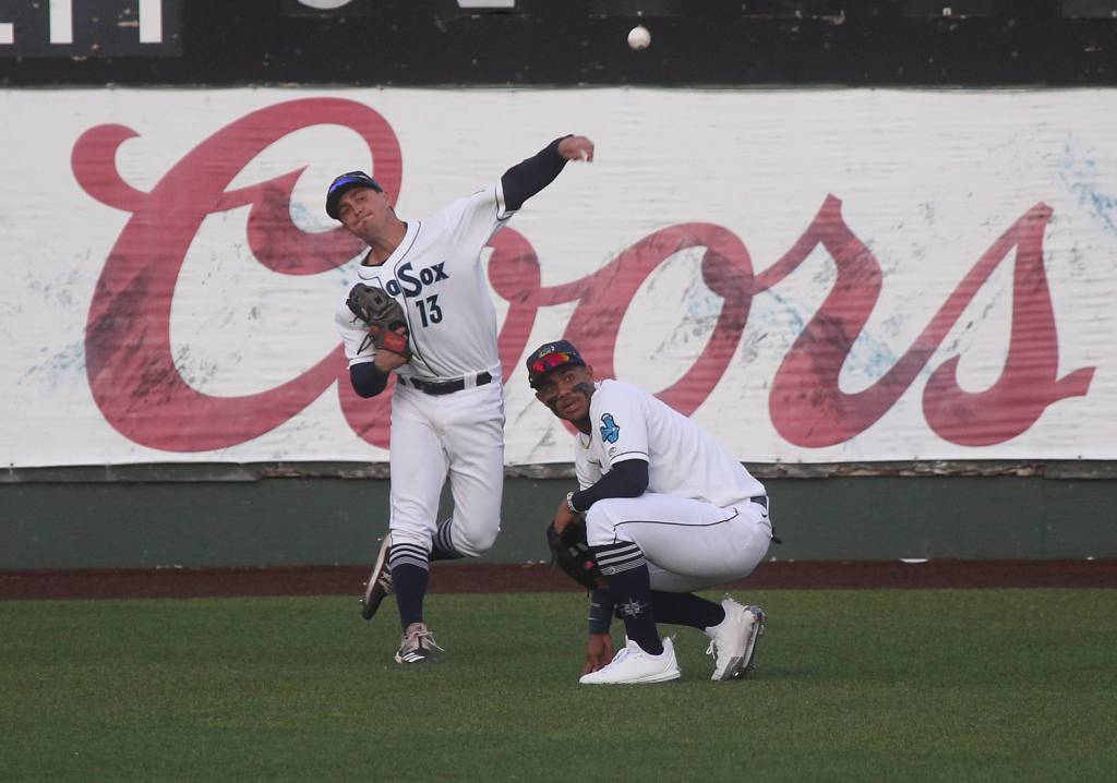 Aquasoxs Jack Larsen throws the ball over teammate Julio Rodriguez. The Everett Aquasox beat the Tri-City Dust Devils in a home opening game at Funko Field on Tuesday, May 11, 2021 in Everett, Washington. (Andy Bronson / The Herald)