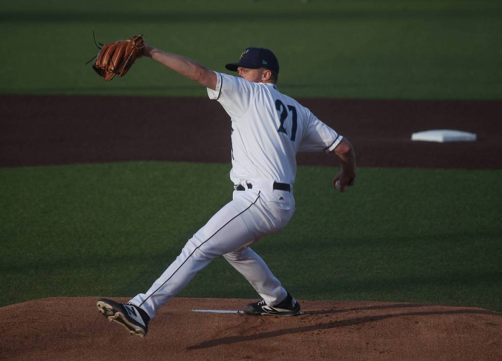 Aquasoxs Tim Elliott winds up as he pitches in the first inning as the Everett Aquasox beat the Tri-City Dust Devils in a home opening game at Funko Field on Tuesday, May 11, 2021 in Everett, Washington. (Andy Bronson / The Herald)