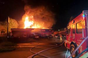 Eastside Tire and Muffler on Avenue D in Snohomish burns early Wednesday. (Snohomish County Fire District 4) 20210512