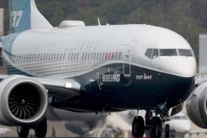 A Boeing 737 Max lands during a test flight in Seattle on Sept. 30, 2020. MUST CREDIT: Bloomberg photo by Chona Kasinger.