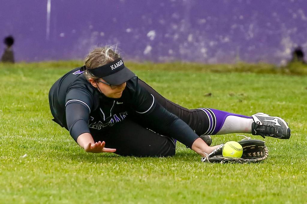 Kamiaks Sara Schnurman makes a diving catch in the third inning of a game against Lakewood in Mukilteo on April 30. (Kevin Clark / The Herald)