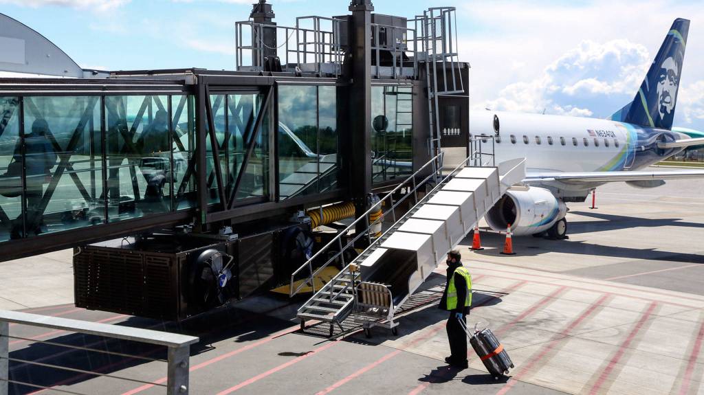 A flight to Las Vegas, boarding Wednesday afternoon at Paine Field in Everett. (Kevin Clark / The Herald)