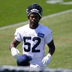 The Seahawks Darrell Taylor waits for a drill to start during rookie minicamp on May 14, 2021, at the teams training facility in Renton. (AP Photo/Elaine Thompson)